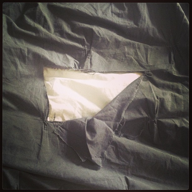 Yep, thats a GIANT hole in my duvet cover
